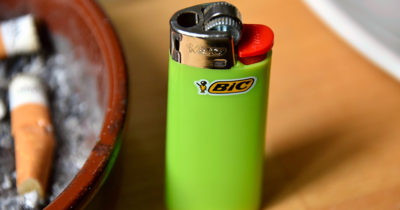 bic lighter, fire, green, plastic, homeless
